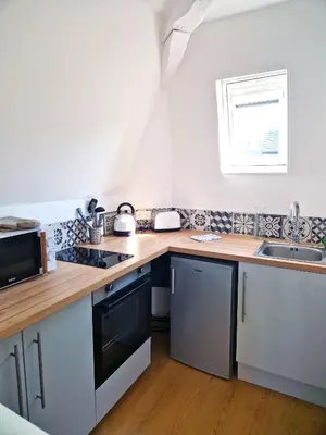 Cuisine ou kitchenette dans l'établissement Les Bons Enfants 8