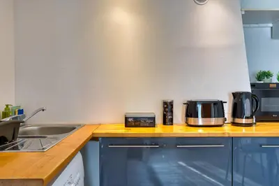 Cuisine ou kitchenette dans l'établissement L'Auréa au centre de Rouen