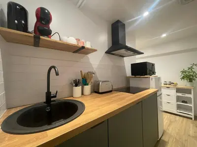 Cuisine ou kitchenette dans l'établissement Escapade Au Vert - Vexin Français - Zoo Safari Thoiry