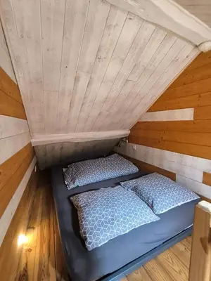 Un ou plusieurs lits dans un hébergement de l'établissement La cabane Insolite