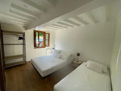Un ou plusieurs lits dans un hébergement de l'établissement Maison à la campagne