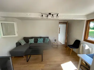 Coin salon dans l'établissement Maison à la campagne