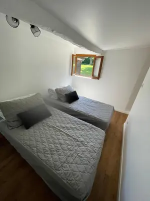 Un ou plusieurs lits dans un hébergement de l'établissement Maison à la campagne