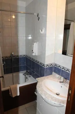 Salle de bains dans l'établissement Golf Hotel