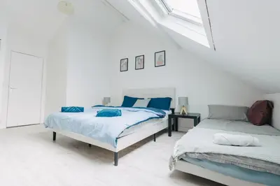 Un ou plusieurs lits dans un hébergement de l'établissement Dieppe Cosy duplex à 2 min du Port et Restaurants Plage à 300m