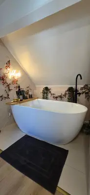 Salle de bains dans l'établissement L'alcôve enchantée