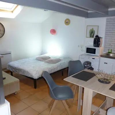 Un ou plusieurs lits dans un hébergement de l'établissement Appartement cosy à Amiens avec jardin