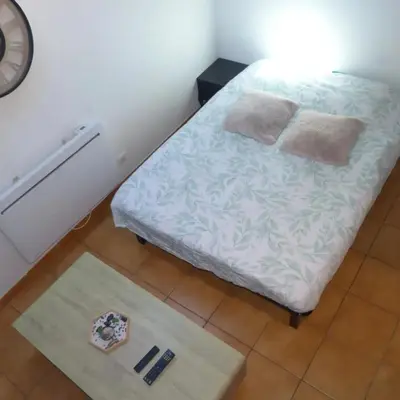Un ou plusieurs lits dans un hébergement de l'établissement Appartement cosy à Amiens avec jardin