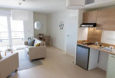 Cuisine ou kitchenette dans l'établissement Résidence Marignan