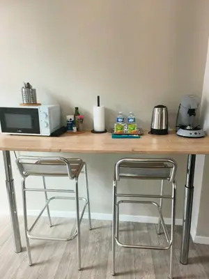 Cuisine ou kitchenette dans l'établissement La casa amiénoise