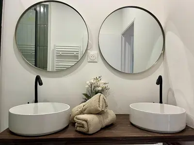 Salle de bains dans l'établissement Les Capucines