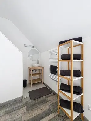 Un ou plusieurs lits dans un hébergement de l'établissement Loft cosy jaccuzi & terrasse