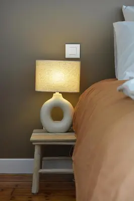 Un ou plusieurs lits dans un hébergement de l'établissement Les Chambres du 32
