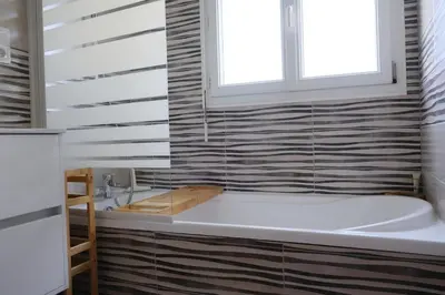 Salle de bains dans l'établissement Evasion Marine, Cozy home