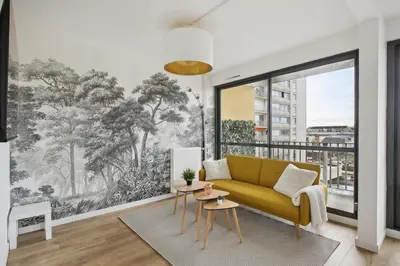 Coin salon dans l'établissement Magnifique Chambre dans une collocation design
