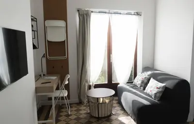Coin salon dans l'établissement Appartement confort à Rouen