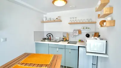 Cuisine ou kitchenette dans l'établissement La Parenthèse Impressionniste