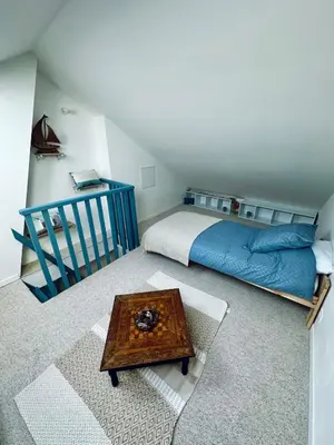 Un ou plusieurs lits dans un hébergement de l'établissement Villa Valentine terrasse vue Mer & Falaises