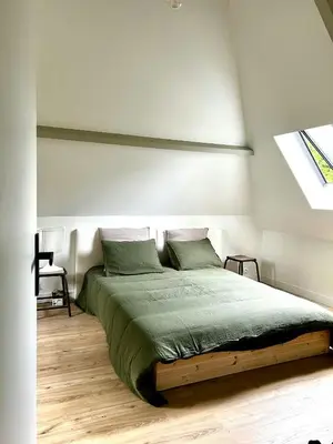 Un ou plusieurs lits dans un hébergement de l'établissement Charming House In Lyons-La-Forêt