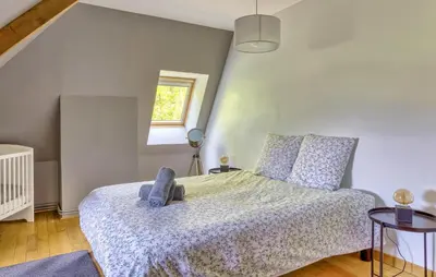 Un ou plusieurs lits dans un hébergement de l'établissement Maison Vue Campagne