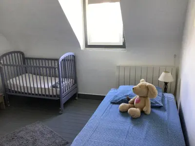 Un ou plusieurs lits dans un hébergement de l'établissement Sara's Home 24