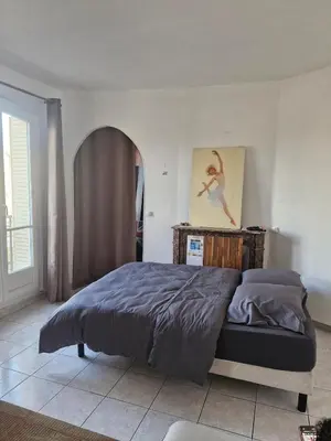 Un ou plusieurs lits dans un hébergement de l'établissement Apartment - 1min to train station - 13min to Paris