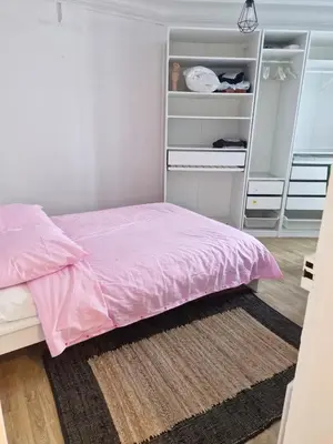 Un ou plusieurs lits dans un hébergement de l'établissement Apartment - 1min to train station - 13min to Paris