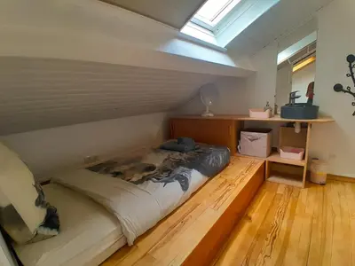 Un ou plusieurs lits dans un hébergement de l'établissement Duplex de Charme avec Bureau - Face Gare RER A