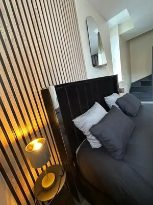 Coin salon dans l'établissement Appart Duplex Proche Centre