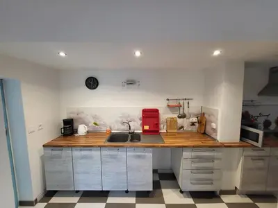 Cuisine ou kitchenette dans l'établissement Gîte de l'Eure