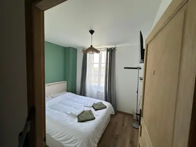 Un ou plusieurs lits dans un hébergement de l'établissement La maison des amis