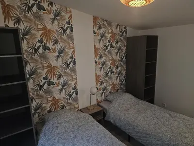 Un ou plusieurs lits dans un hébergement de l'établissement Le REFUGE DIEPPOIS plein centre ville BY HOLIDIEPPE