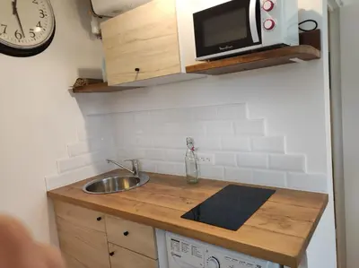Cuisine ou kitchenette dans l'établissement Gite du Verger