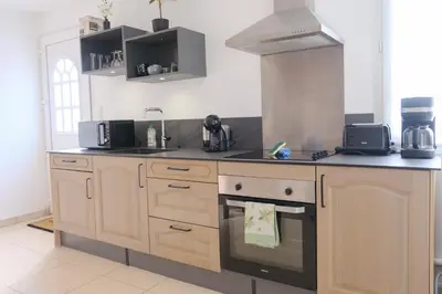 Cuisine ou kitchenette dans l'établissement Maison Angèle
