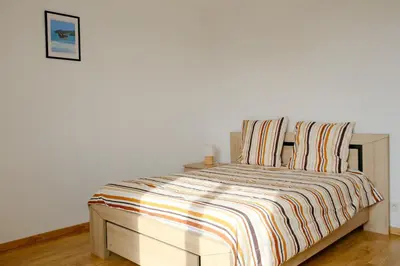 Un ou plusieurs lits dans un hébergement de l'établissement Maison Angèle