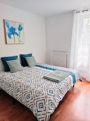 Un ou plusieurs lits dans un hébergement de l'établissement Maison authentique du Vexin