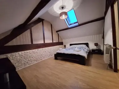 Un ou plusieurs lits dans un hébergement de l'établissement L'Auberge de la fontaine 