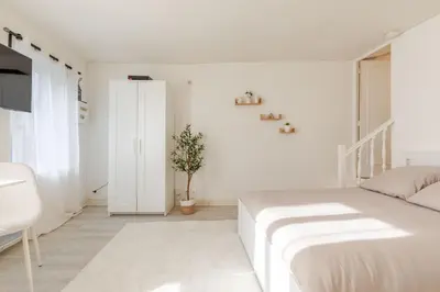 Un ou plusieurs lits dans un hébergement de l'établissement Appartement Cosy Tout confort Elbeuf