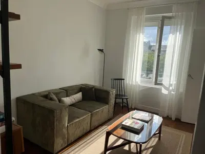 Coin salon dans l'établissement Superbe Appartement Central