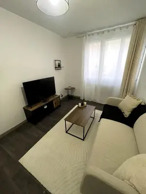 Télévision ou salle de divertissement dans l'établissement Apartment 2