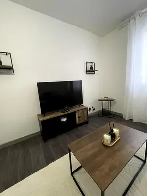 Télévision ou salle de divertissement dans l'établissement Apartment 2