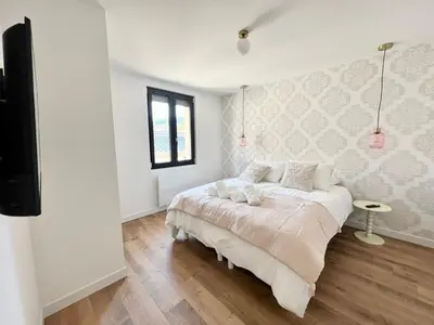 Un ou plusieurs lits dans un hébergement de l'établissement Le Hausmanien, à deux pas du port