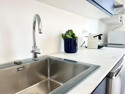 Cuisine ou kitchenette dans l'établissement Le Hausmanien, à deux pas du port