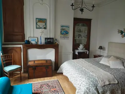 Un ou plusieurs lits dans un hébergement de l'établissement Appartement Cosy avec jardinet