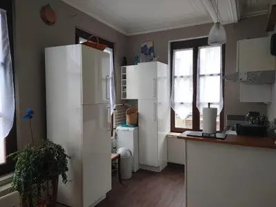 Cuisine ou kitchenette dans l'établissement Appartement Cosy avec jardinet