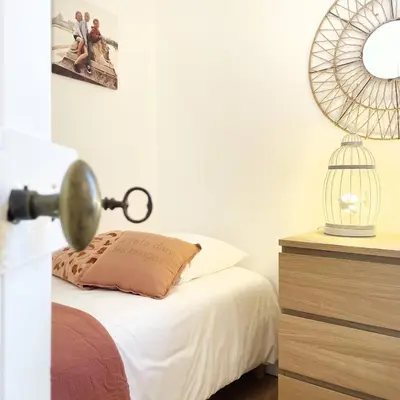 Un ou plusieurs lits dans un hébergement de l'établissement Chalet Aux Oiseaux - by La Boite en Plus