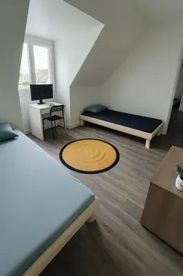 Un ou plusieurs lits dans un hébergement de l'établissement Comme à la Maison - Penly