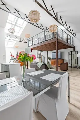 Coin salon dans l'établissement Le Faubourg Saint Martin Loft and Spa 1