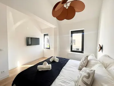 Un ou plusieurs lits dans un hébergement de l'établissement Appartement le Vintage, à deux pas du Port