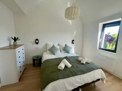 Un ou plusieurs lits dans un hébergement de l'établissement Appartement le Vintage, à deux pas du Port